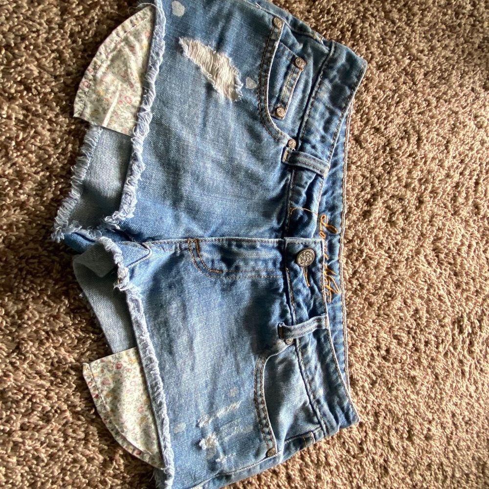 Ripped polkadot shorts